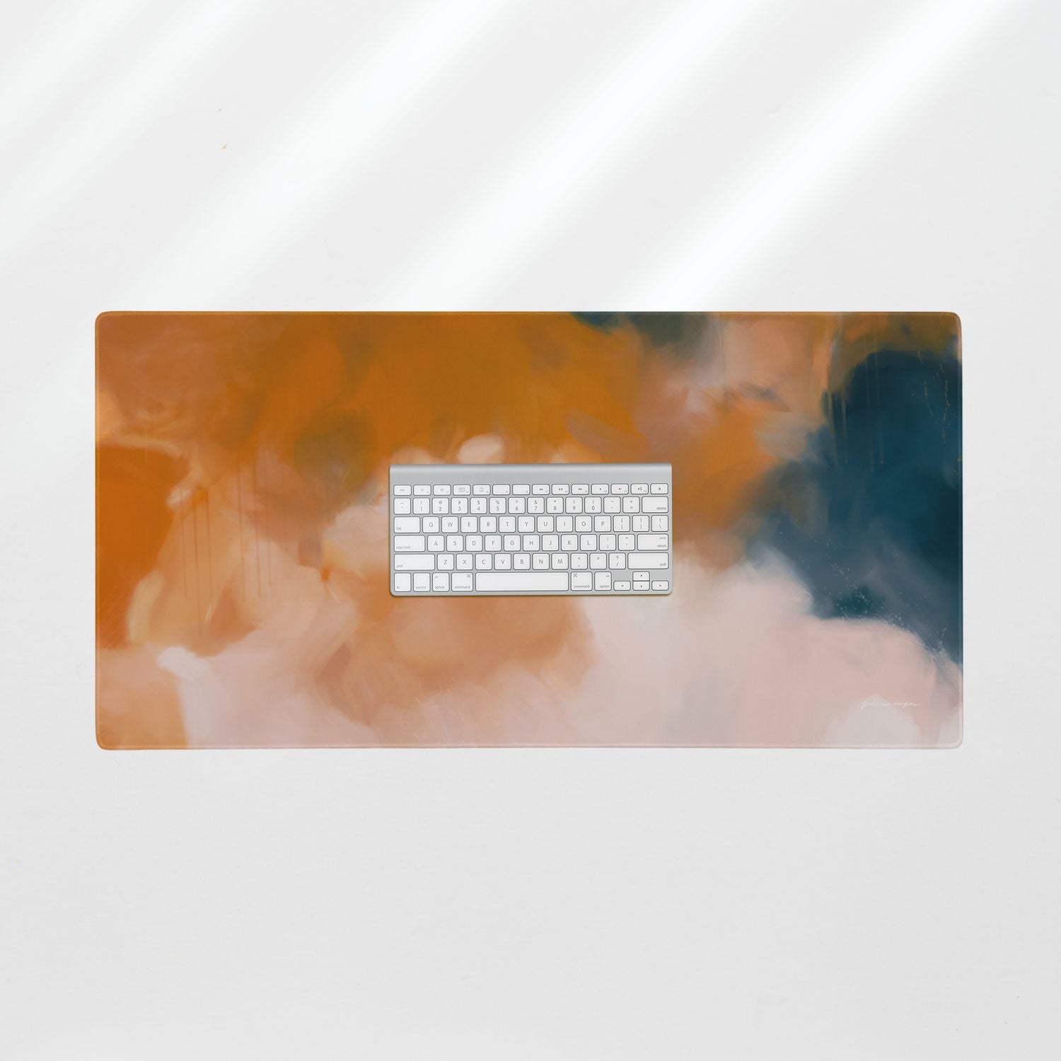 Amelie, blue and orange desk mat for styling your office desk. Featuring artwork by Parima Studio. Home office styling accessories, cubicle styling accessories.