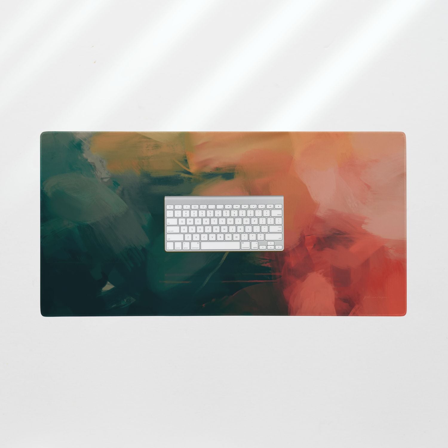 Eventide, green and red desk mat for styling your office desk. Featuring artwork by Parima Studio. Home office styling accessories, cubicle styling accessories.