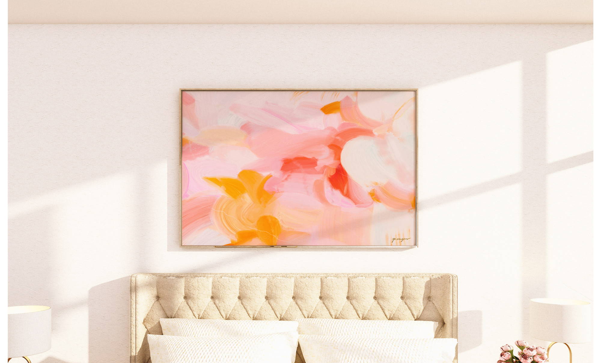 Oversized pink and yellow art over the bed