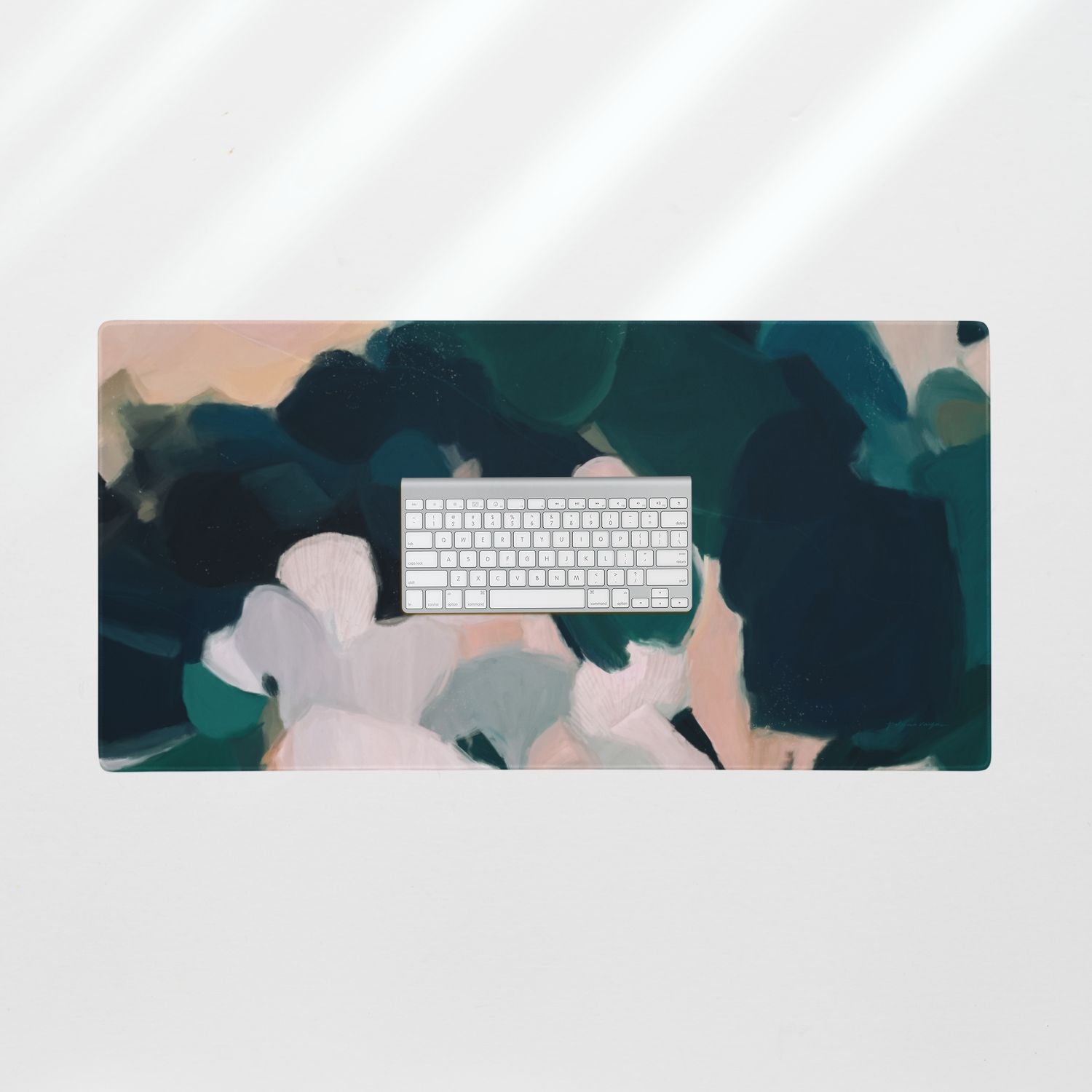 Aerwyn, green and pink desk mat for styling your office desk. Featuring artwork by Parima Studio. Home office styling accessories, cubicle styling accessories.