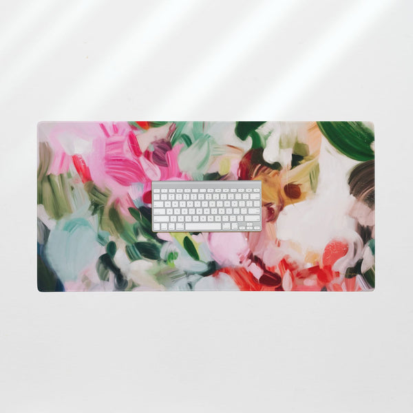 Bloom, pink and green desk mat for styling your office desk. Featuring artwork by Parima Studio. Home office styling accessories, cubicle styling accessories.