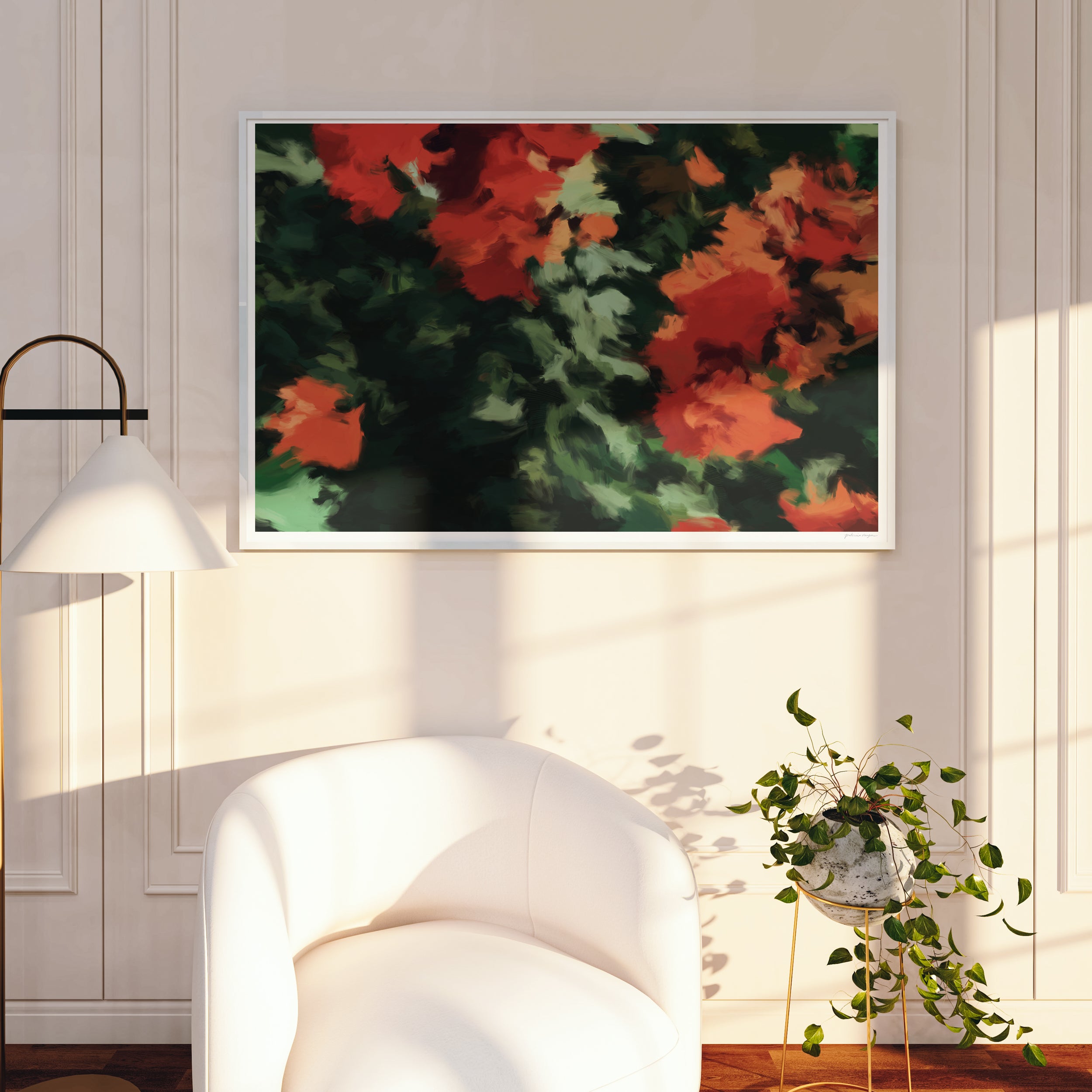 Rhosyn abstract large horizontal landspace wall art print with deep red and green colors on a wall above a white chair.